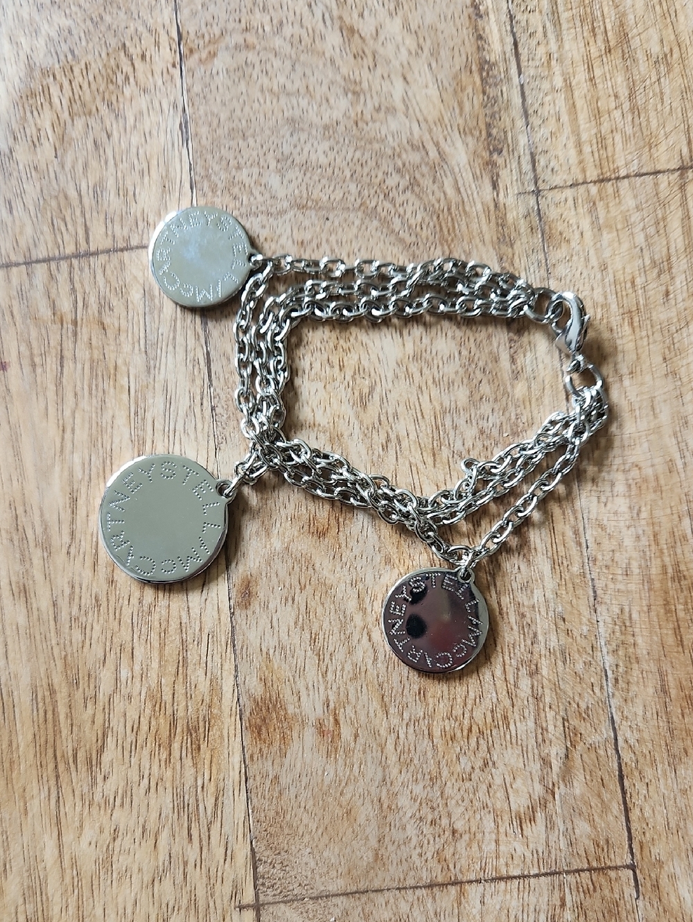 Stella McCartney Silver Tone Triple-Disc Chain Bracelet.